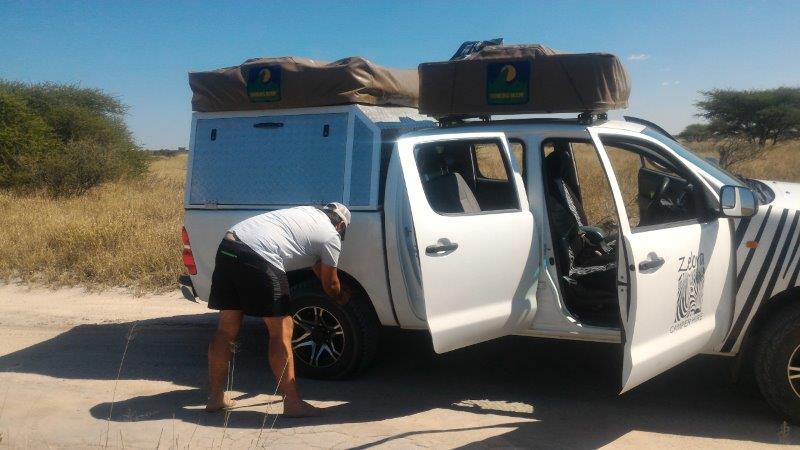 Fixing punctured tyre.