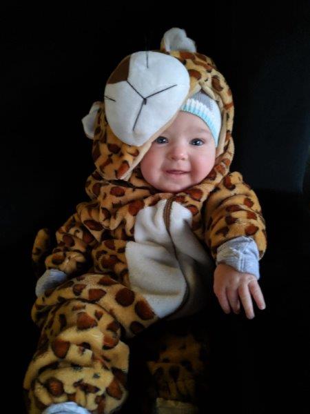 Baby dressed in leopard costume