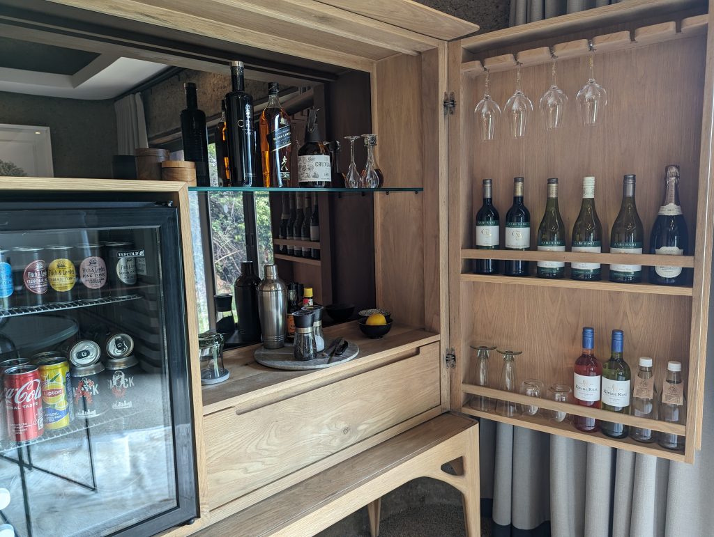 Fully stocked mini bar at Sabi Sabi Earth Lodge