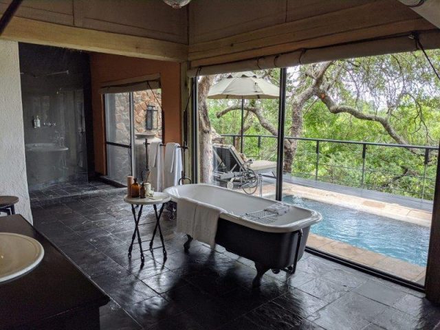 bathroom overlooking plunge pool Singita Ebony Lodge suite