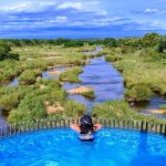 Cara in Kruger Shalati pool looking out over the river