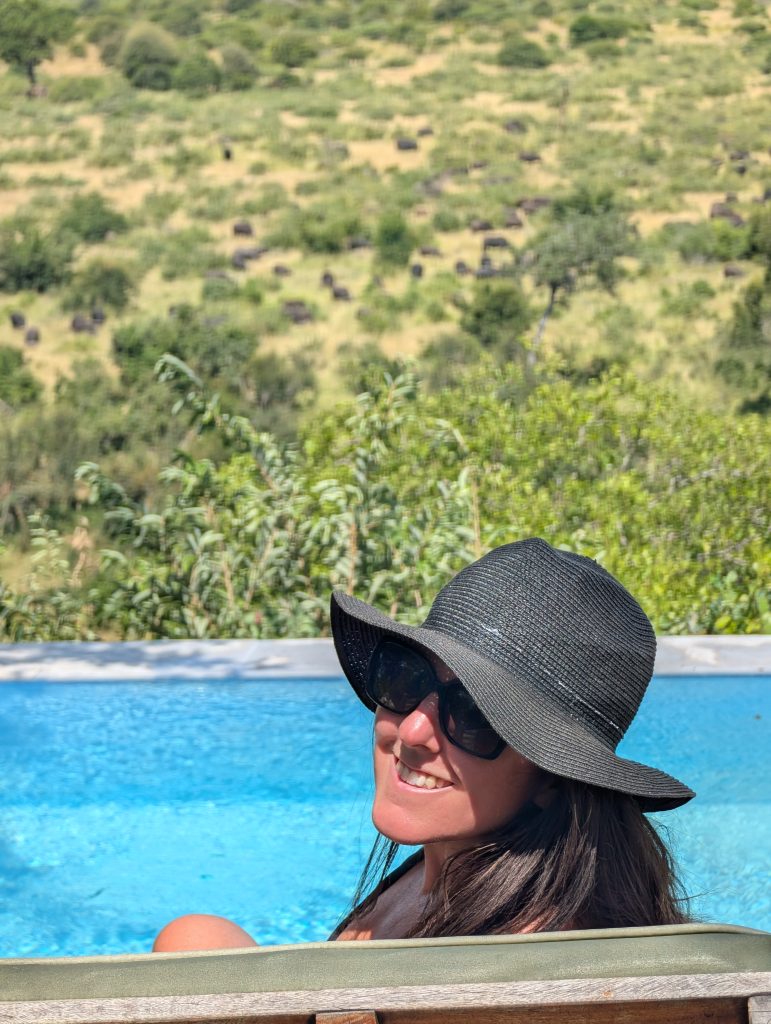 pool at Misava Safari Camp with buffalo in background