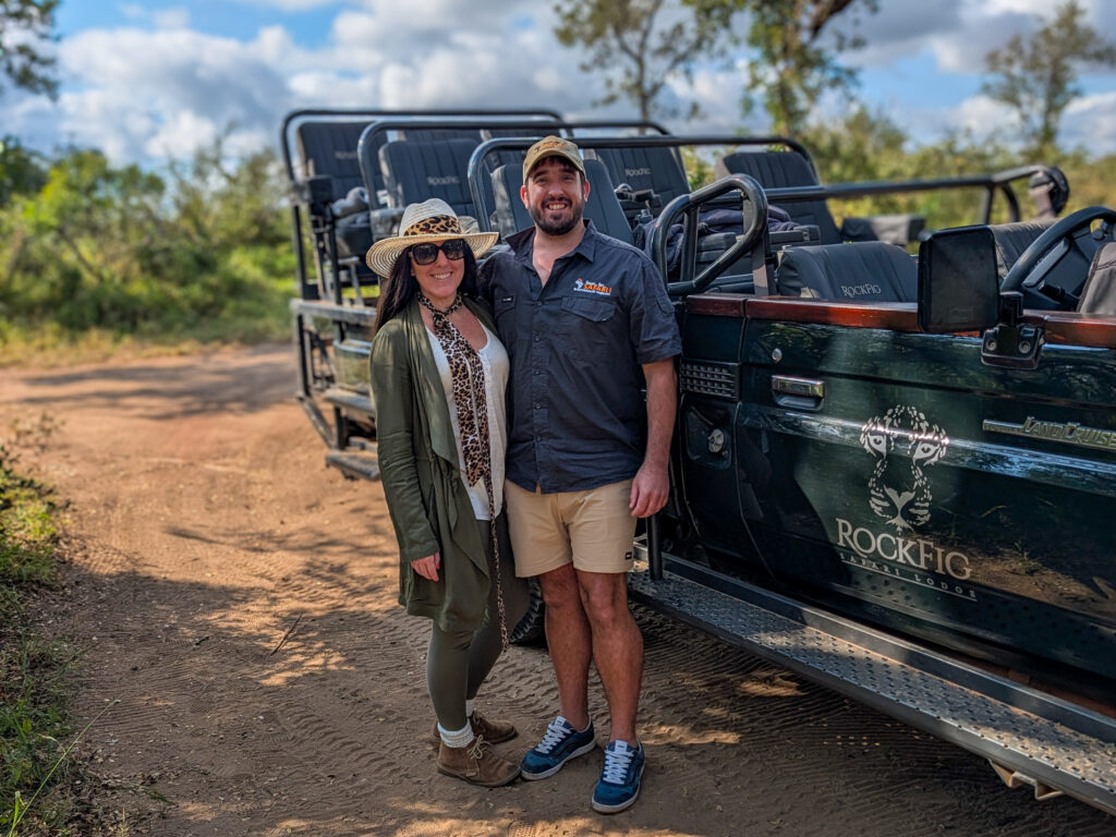 Cara and Van in front of RockFig Safari Lodge open safari vehicle
