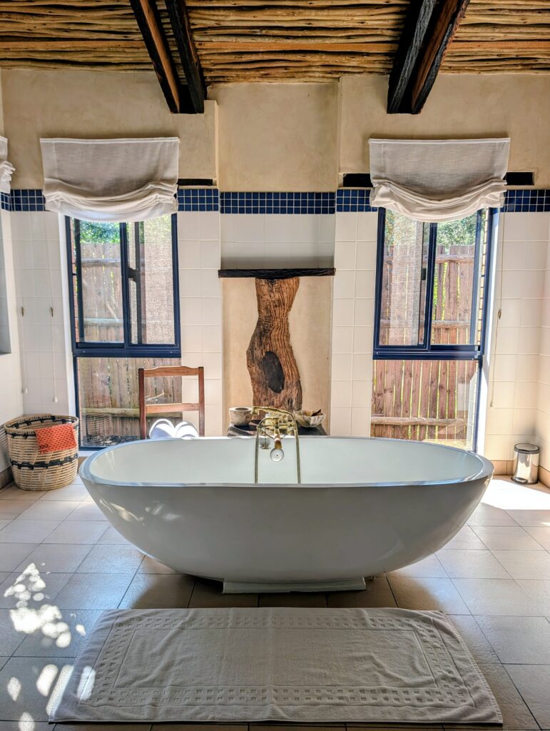 Freestanding bath in Baobab Ridge Safari Lodge ensuite