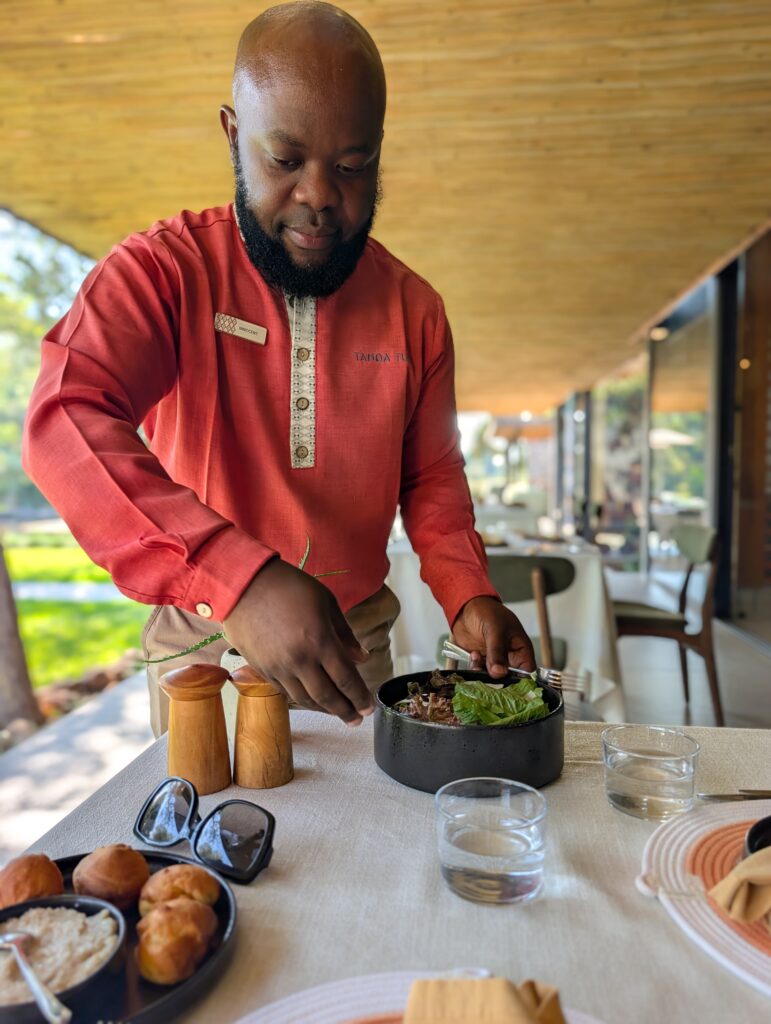 Tanda Tula serving lunch