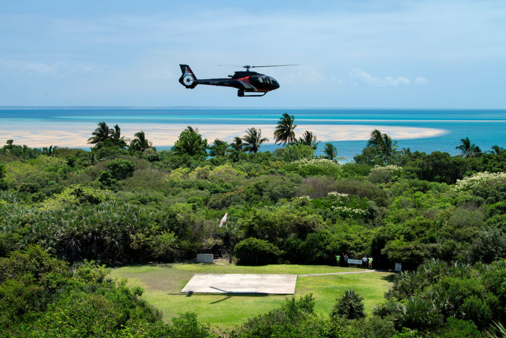 Helicopter transfer arriving at Benguerra Island in Mozambique
